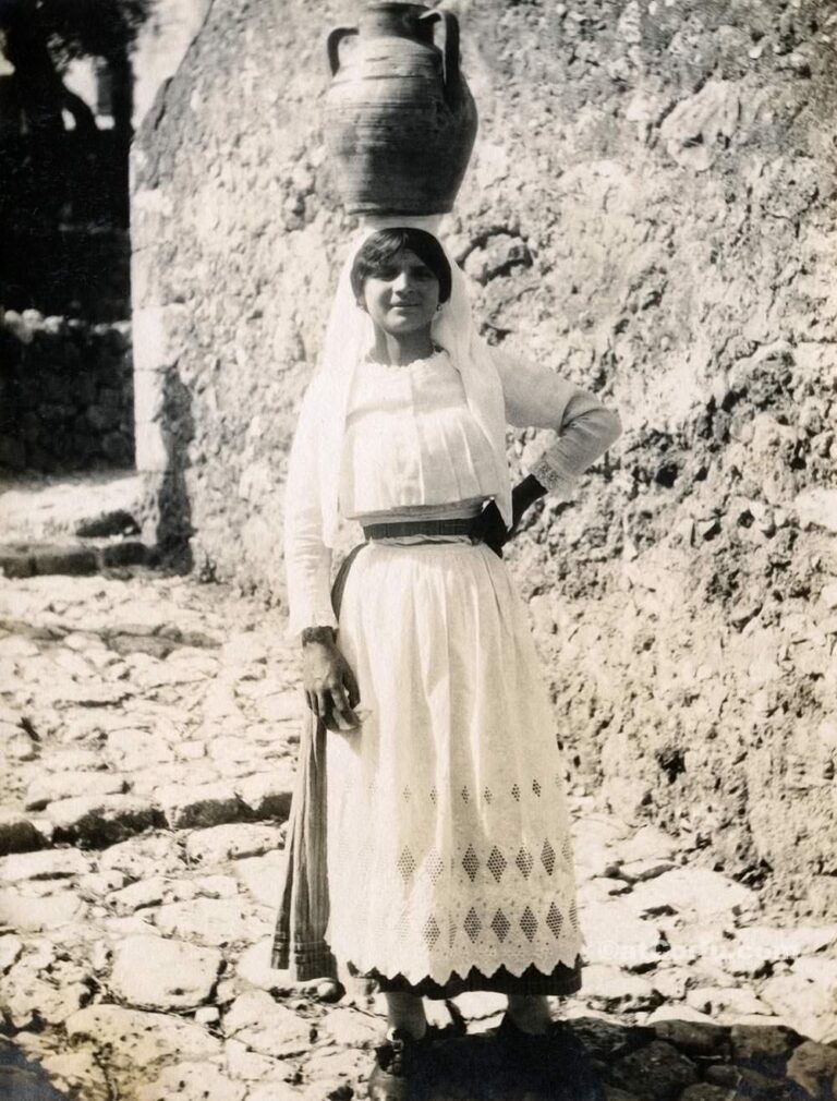 Girl carrying water 1930