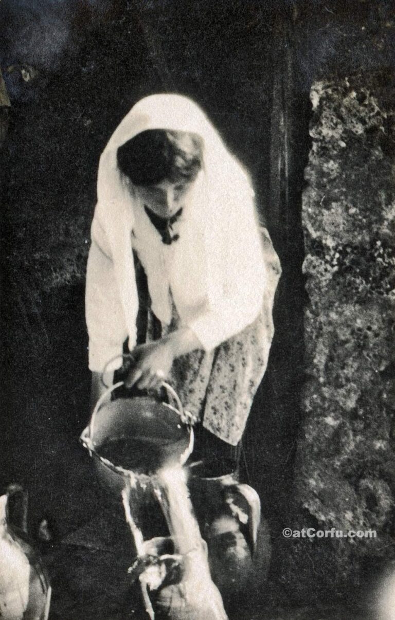 A Girl carrying water 1920