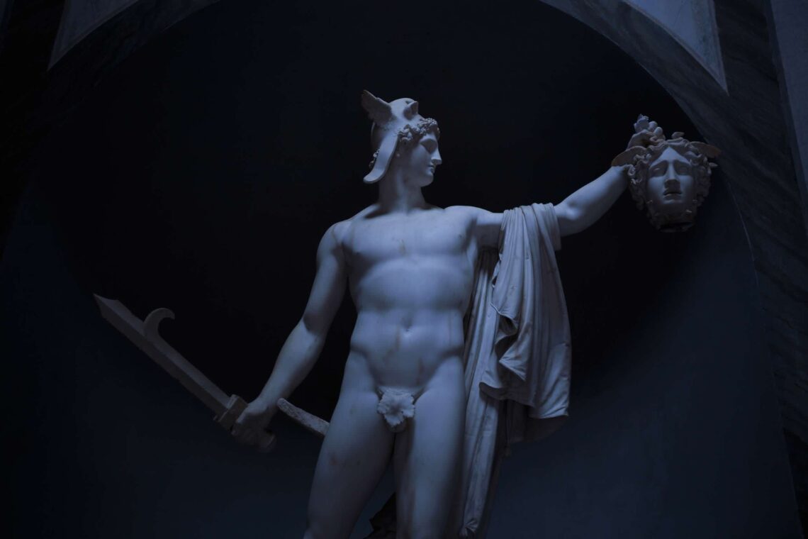 Perseus holding the severed head of the Medusa