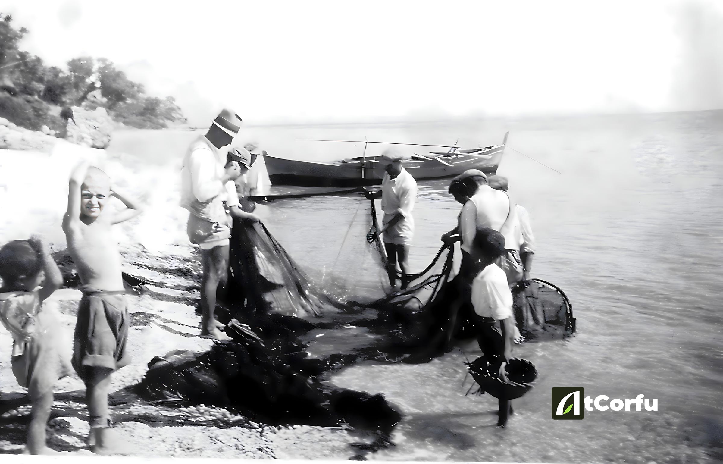 fishermen cleaning nets laopetra
